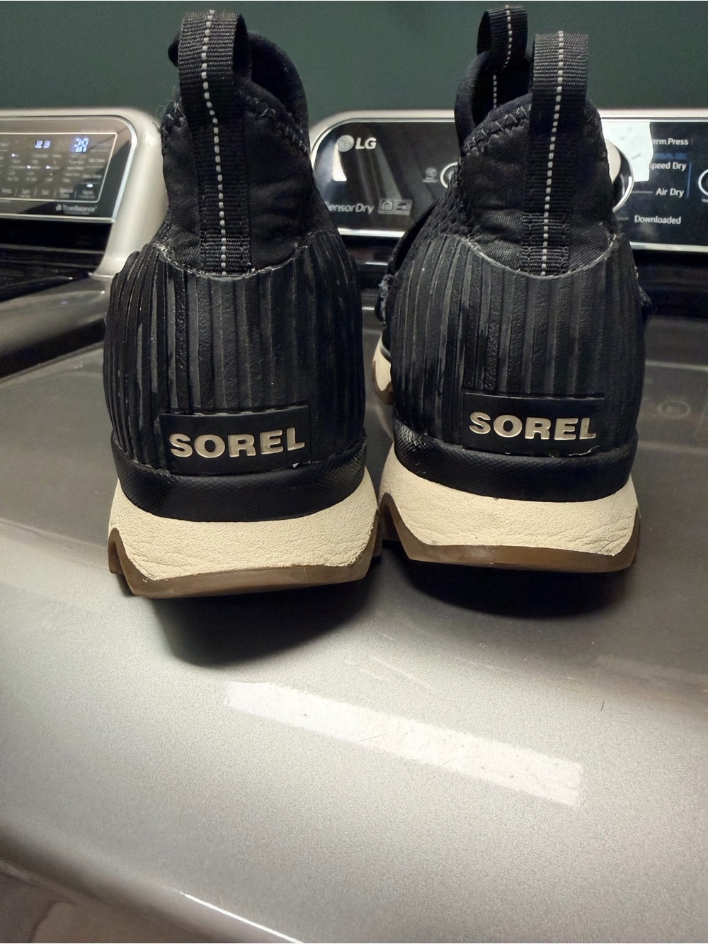 Sorel Black and Cream Slip-On Athletic Sneakers